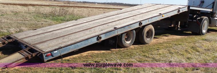 image for item J1304 1983 Wisconsin 2500-22 tilt deck trailer