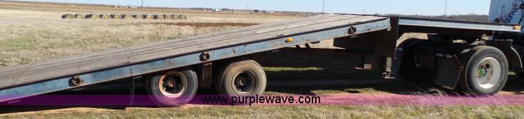 image for item J1304 1983 Wisconsin 2500-22 tilt deck trailer