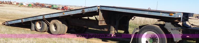 image for item J1304 1983 Wisconsin 2500-22 tilt deck trailer