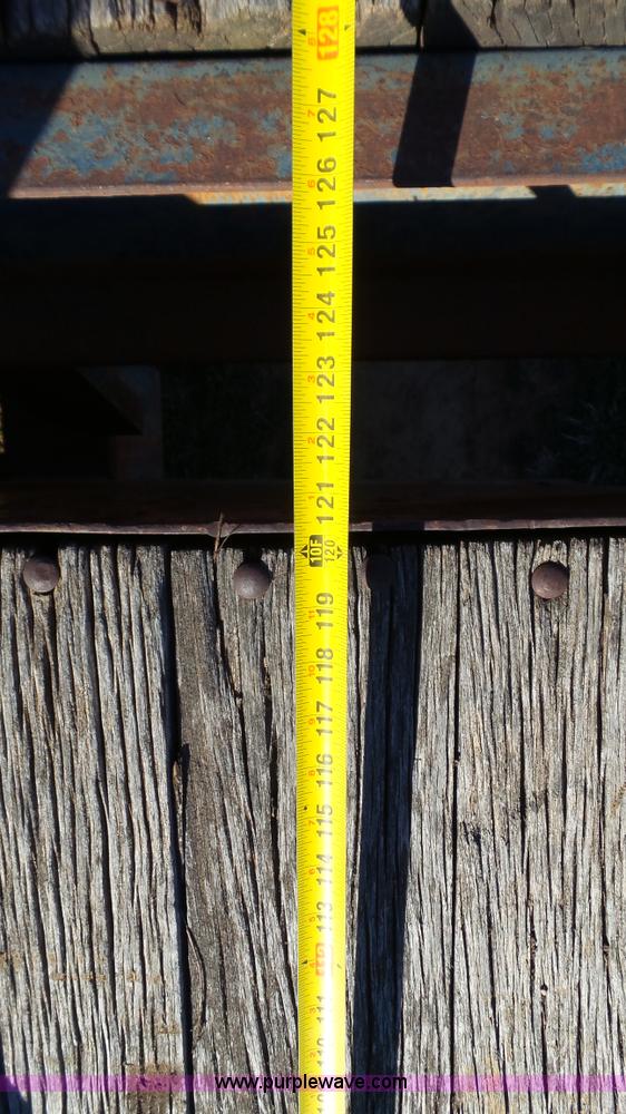 image for item J1304 1983 Wisconsin 2500-22 tilt deck trailer