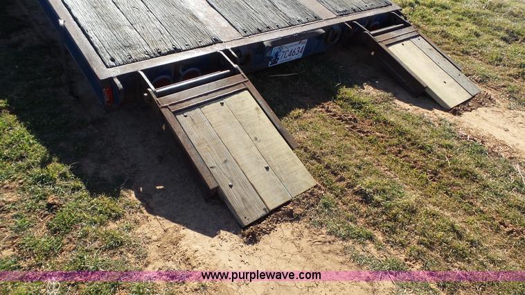 image for item J1304 1983 Wisconsin 2500-22 tilt deck trailer