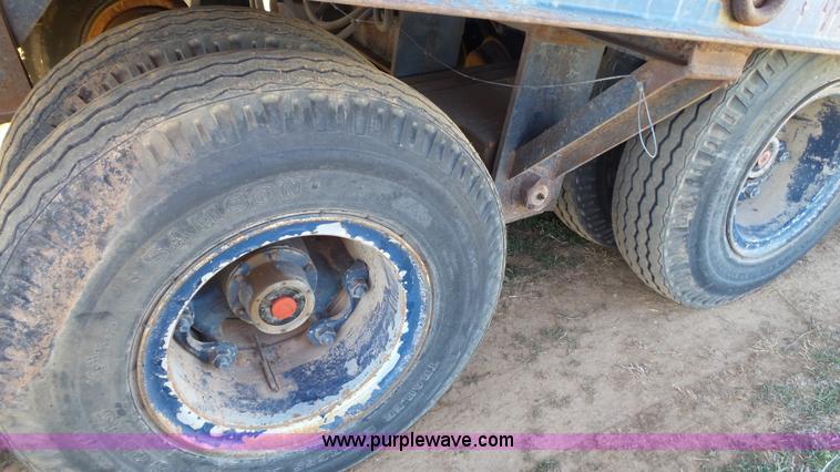 image for item J1304 1983 Wisconsin 2500-22 tilt deck trailer