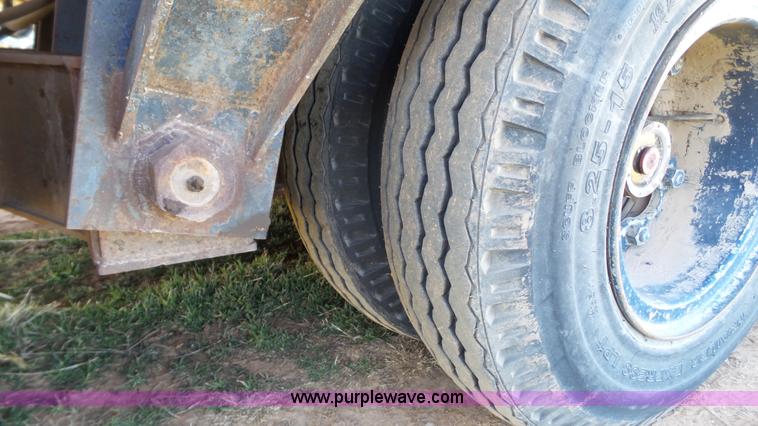 image for item J1304 1983 Wisconsin 2500-22 tilt deck trailer