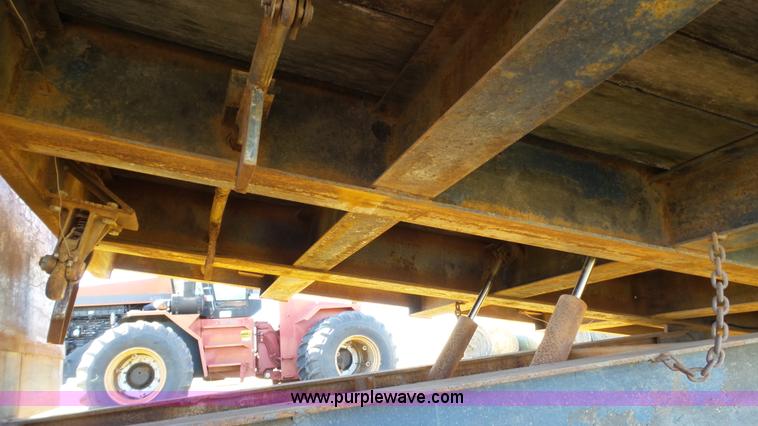 image for item J1304 1983 Wisconsin 2500-22 tilt deck trailer