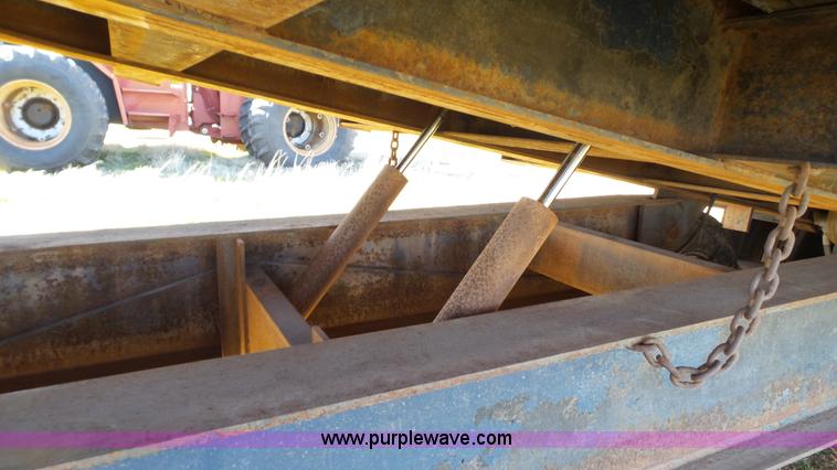 image for item J1304 1983 Wisconsin 2500-22 tilt deck trailer