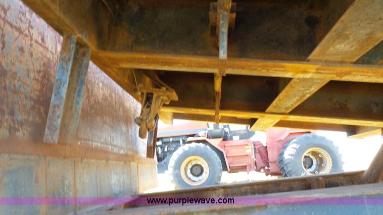 image for item J1304 1983 Wisconsin 2500-22 tilt deck trailer