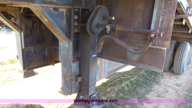 image for item J1304 1983 Wisconsin 2500-22 tilt deck trailer