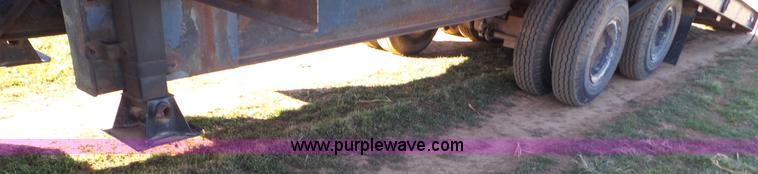 image for item J1304 1983 Wisconsin 2500-22 tilt deck trailer