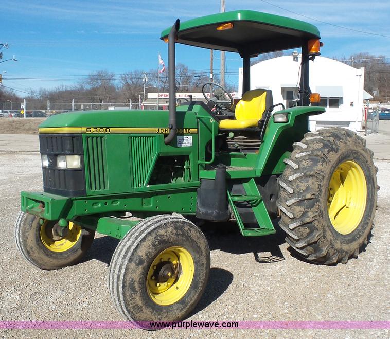 image for item J4519 1995 John Deere 6300 tractor