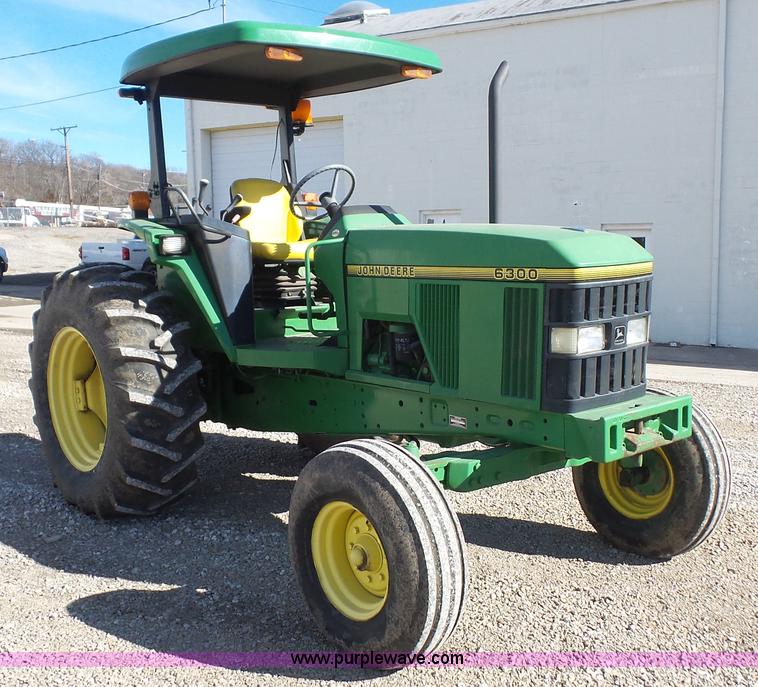 image for item J4519 1995 John Deere 6300 tractor