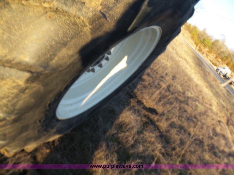 image for item K1261 2008 New Holland T6030 tractor