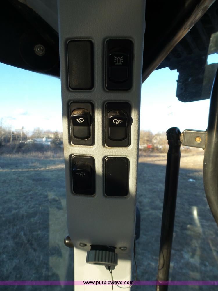 image for item K1261 2008 New Holland T6030 tractor