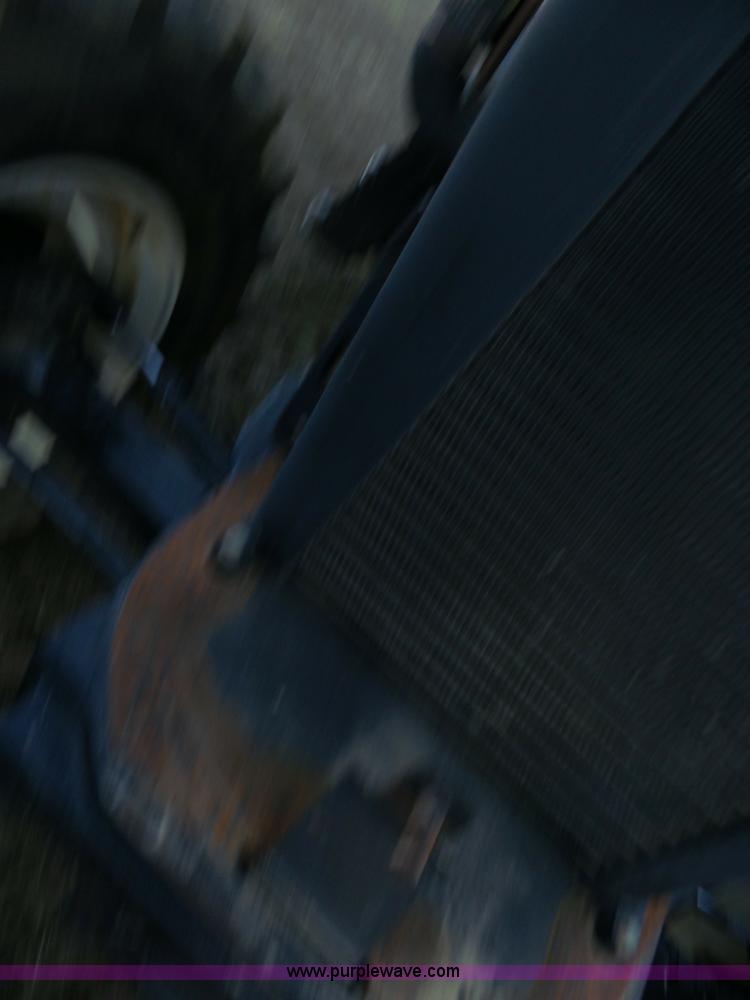 image for item K1261 2008 New Holland T6030 tractor