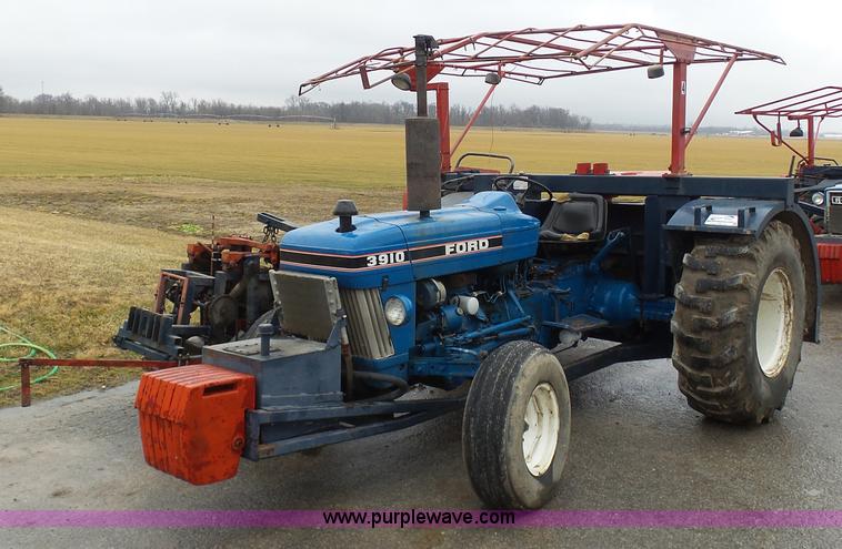 image for item K7664 Ford 3910 tractor with Brouwer sod harvester