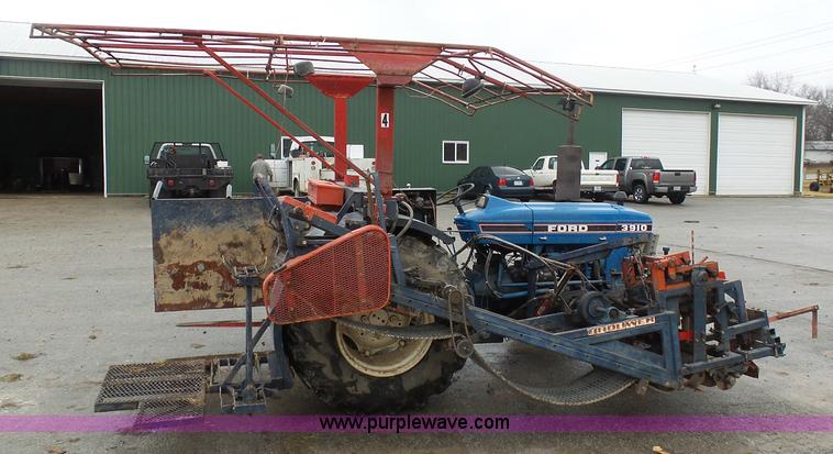 image for item K7664 Ford 3910 tractor with Brouwer sod harvester