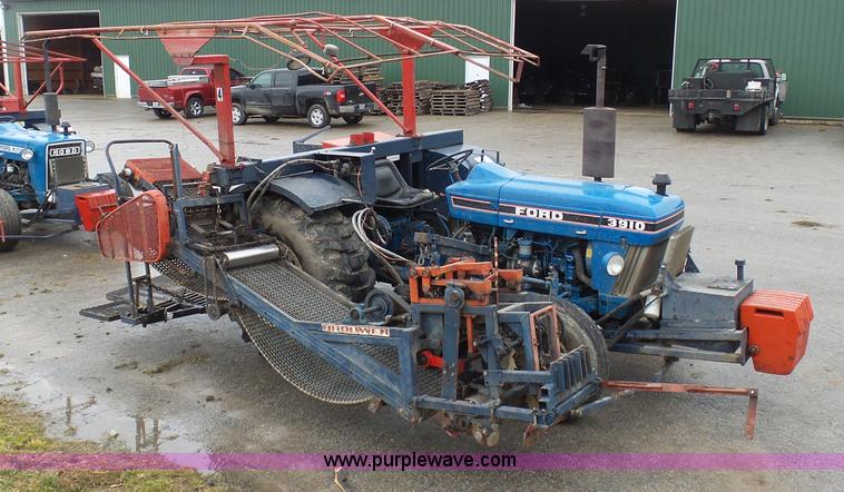 image for item K7664 Ford 3910 tractor with Brouwer sod harvester