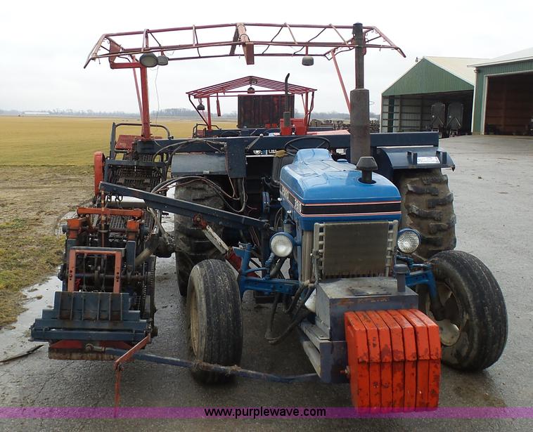 image for item K7664 Ford 3910 tractor with Brouwer sod harvester