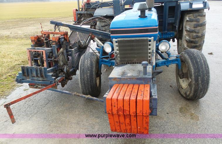 image for item K7664 Ford 3910 tractor with Brouwer sod harvester