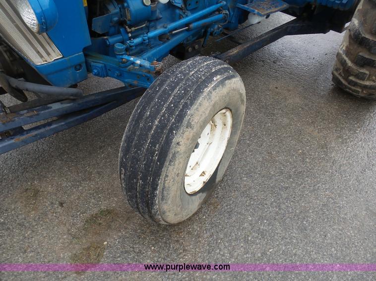 image for item K7664 Ford 3910 tractor with Brouwer sod harvester