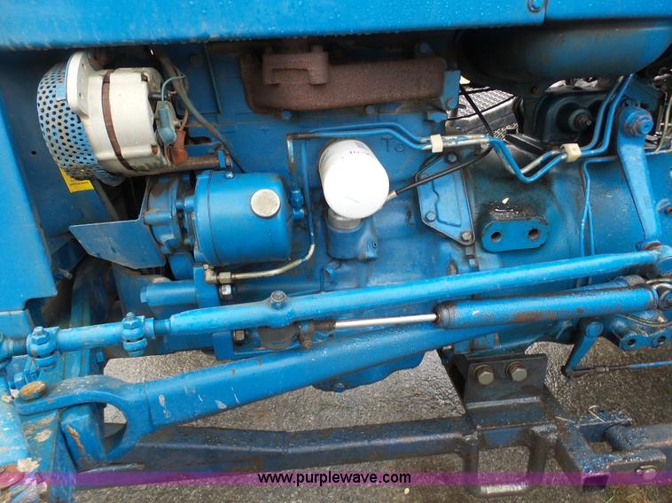 image for item K7664 Ford 3910 tractor with Brouwer sod harvester