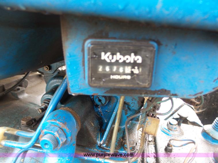 image for item K7664 Ford 3910 tractor with Brouwer sod harvester