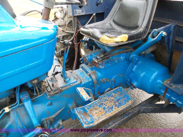 image for item K7664 Ford 3910 tractor with Brouwer sod harvester