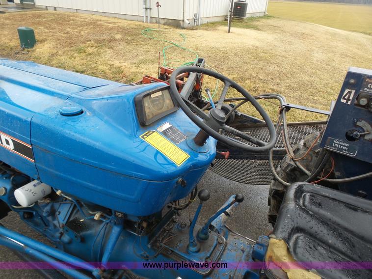 image for item K7664 Ford 3910 tractor with Brouwer sod harvester