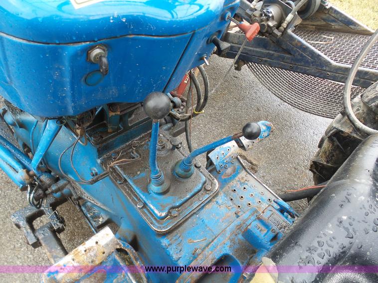 image for item K7664 Ford 3910 tractor with Brouwer sod harvester