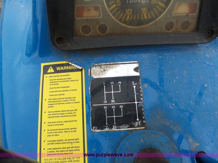 image for item K7664 Ford 3910 tractor with Brouwer sod harvester