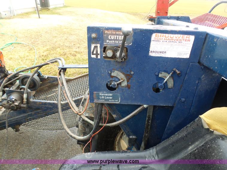 image for item K7664 Ford 3910 tractor with Brouwer sod harvester