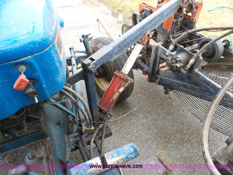 image for item K7664 Ford 3910 tractor with Brouwer sod harvester