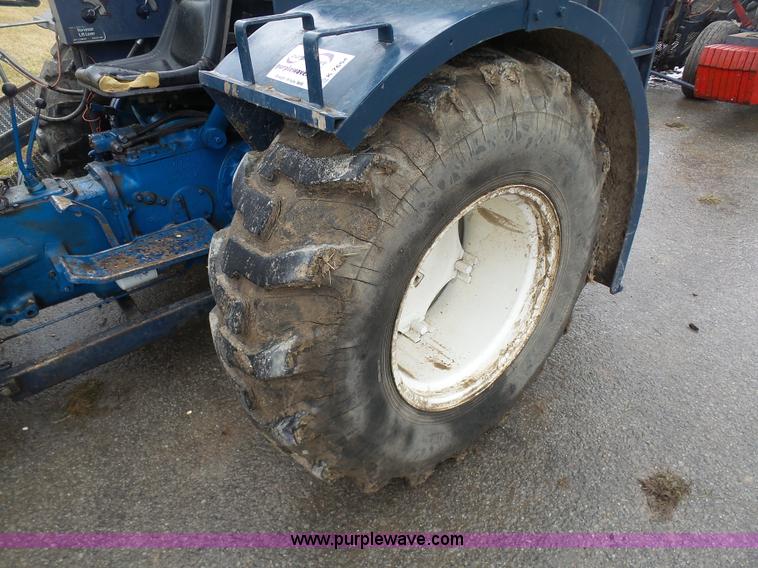 image for item K7664 Ford 3910 tractor with Brouwer sod harvester