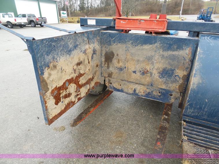 image for item K7664 Ford 3910 tractor with Brouwer sod harvester