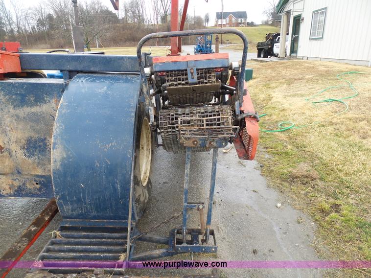 image for item K7664 Ford 3910 tractor with Brouwer sod harvester