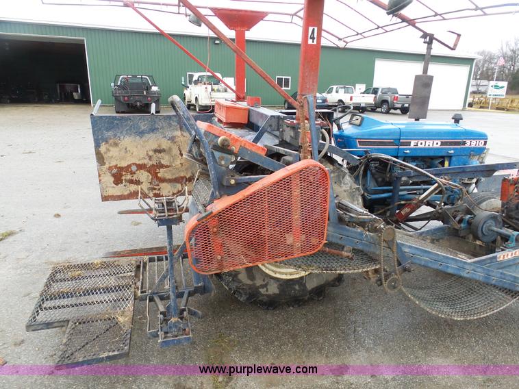 image for item K7664 Ford 3910 tractor with Brouwer sod harvester