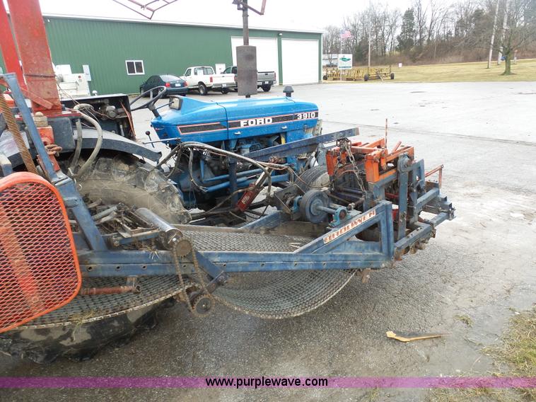 image for item K7664 Ford 3910 tractor with Brouwer sod harvester
