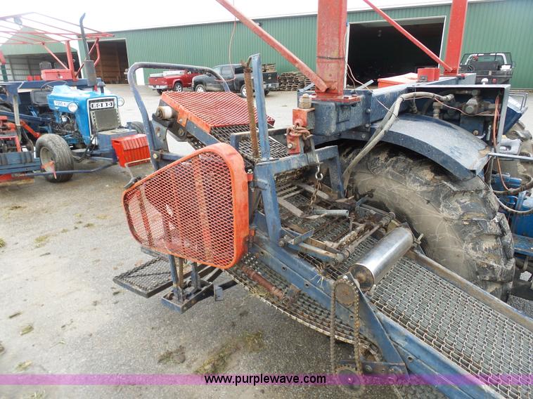 image for item K7664 Ford 3910 tractor with Brouwer sod harvester