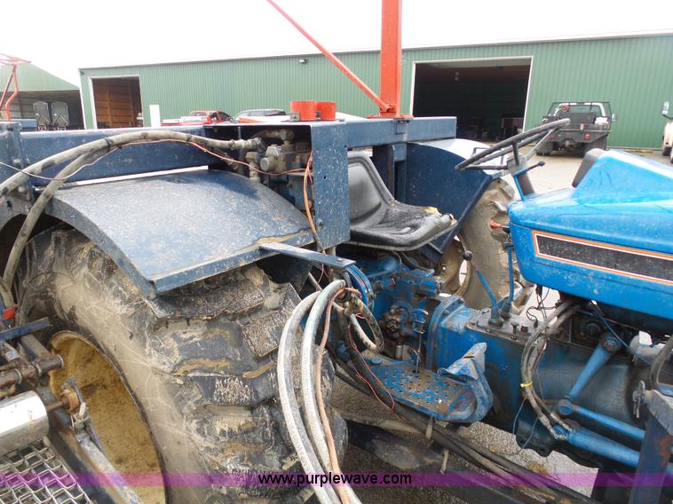 image for item K7664 Ford 3910 tractor with Brouwer sod harvester