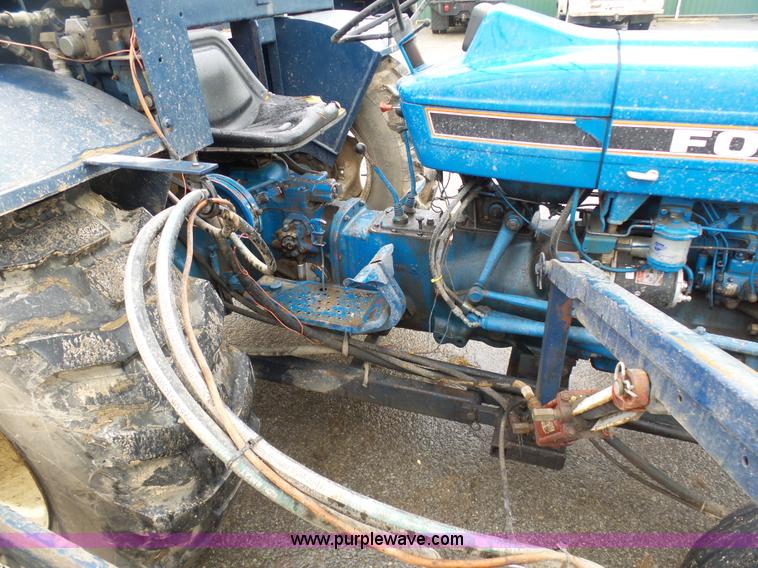 image for item K7664 Ford 3910 tractor with Brouwer sod harvester