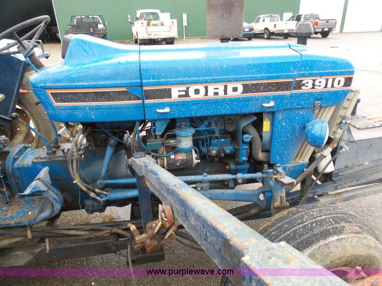 image for item K7664 Ford 3910 tractor with Brouwer sod harvester