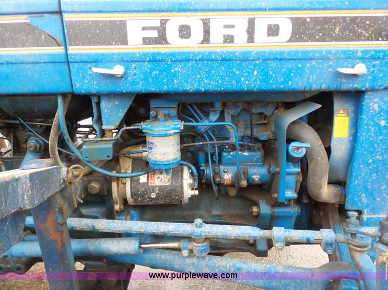 image for item K7664 Ford 3910 tractor with Brouwer sod harvester