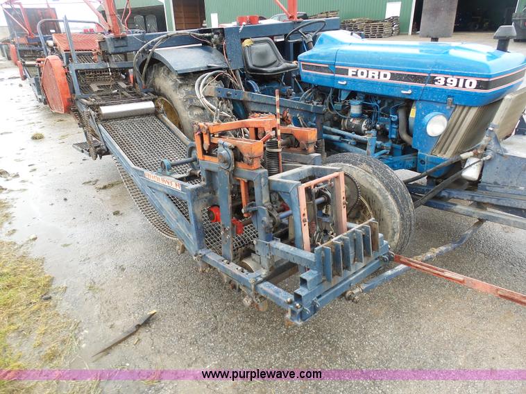 image for item K7664 Ford 3910 tractor with Brouwer sod harvester