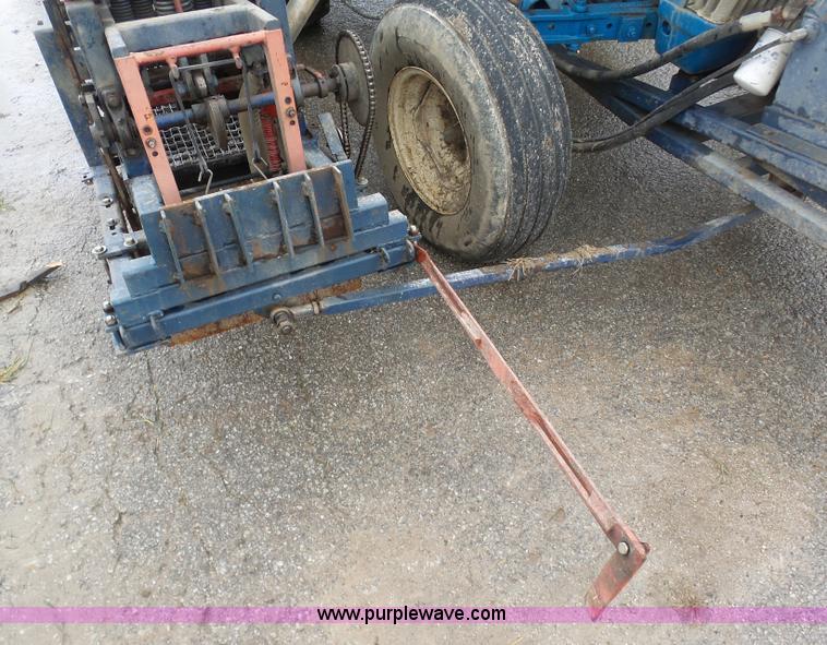 image for item K7664 Ford 3910 tractor with Brouwer sod harvester