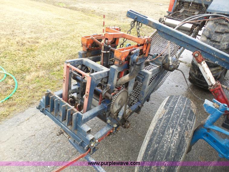 image for item K7664 Ford 3910 tractor with Brouwer sod harvester