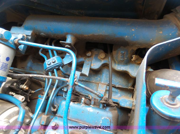 image for item K7664 Ford 3910 tractor with Brouwer sod harvester