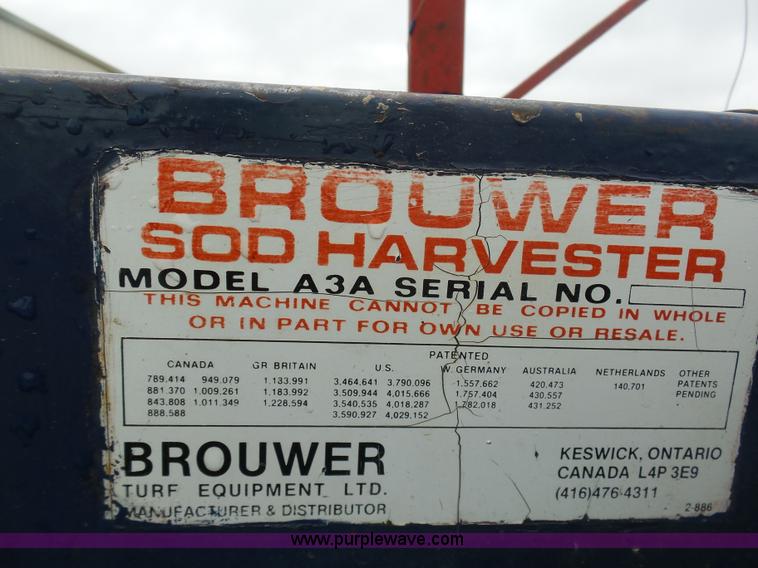 image for item K7664 Ford 3910 tractor with Brouwer sod harvester