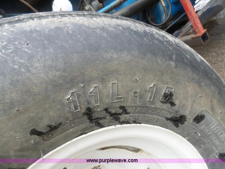 image for item K7665 Ford 3600 tractor with Brouwer sod harvester