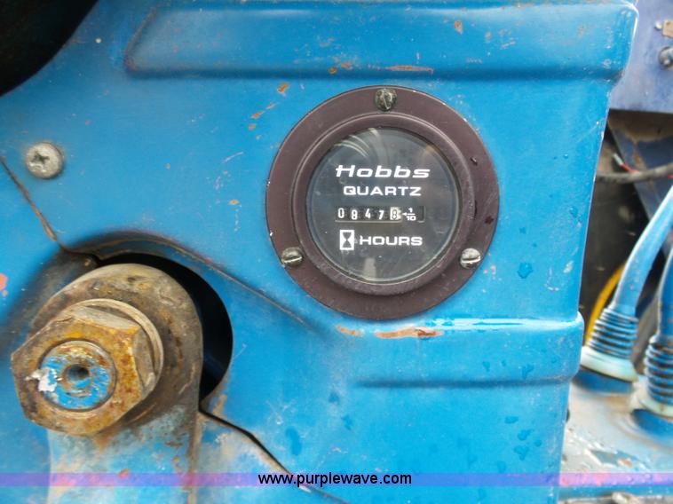 image for item K7665 Ford 3600 tractor with Brouwer sod harvester