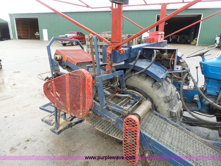 image for item K7665 Ford 3600 tractor with Brouwer sod harvester