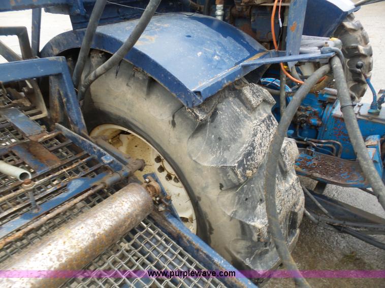 image for item K7665 Ford 3600 tractor with Brouwer sod harvester